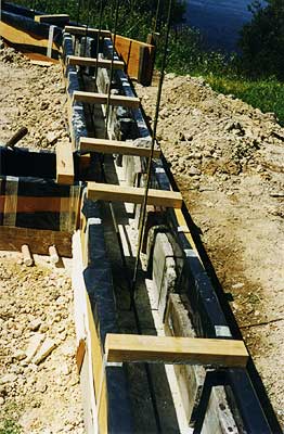 granite slabs lining the external face
