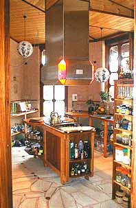 the kitchen shelves filled