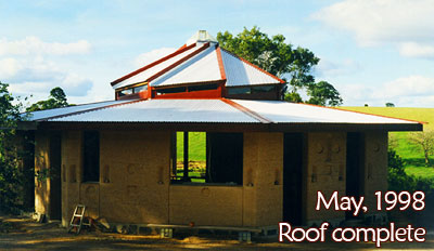 The roof clad and wearing the temporary plastic cupola